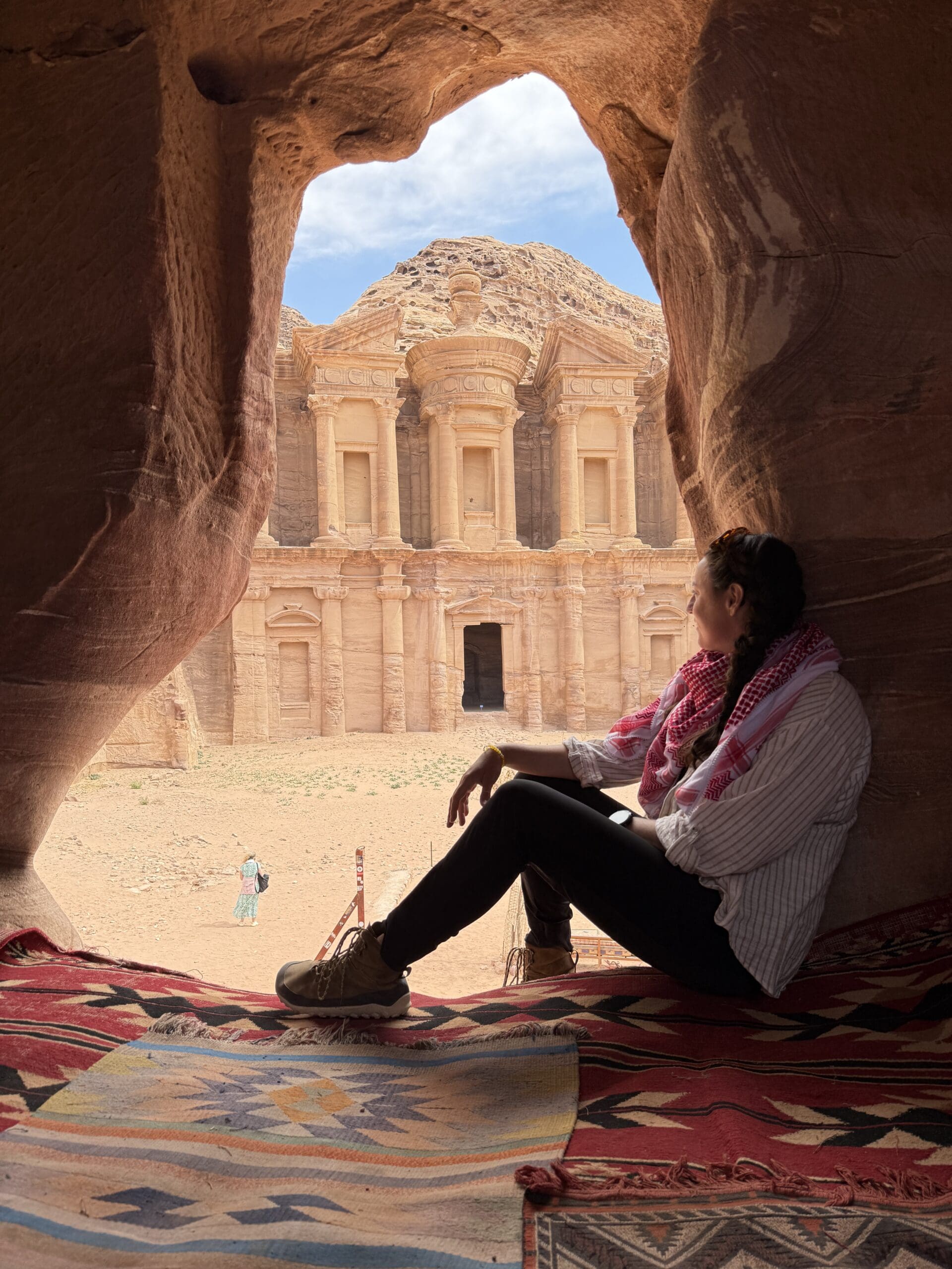 Eid, a Bedouin guide sitting by the fire with Kiera